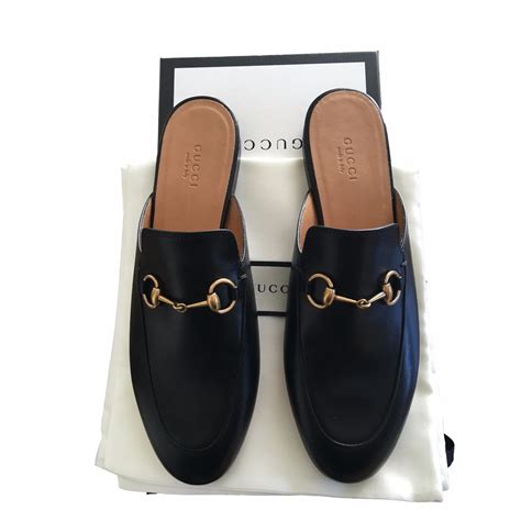 black Gucci mules